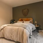 Stylish bedroom with neutral tones.