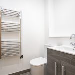Modern bathroom with sleek fixtures.