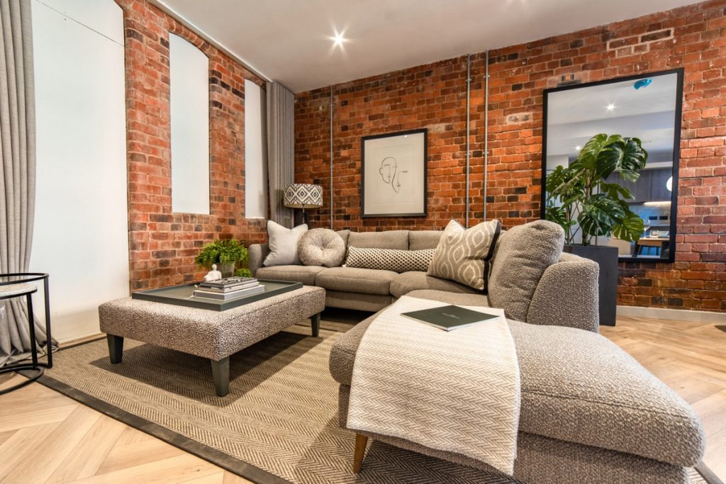 Stylish living room with exposed brick.