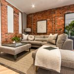 Stylish living room with exposed brick.