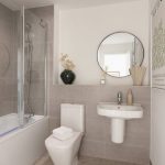 Modern, stylish bathroom with amenities.