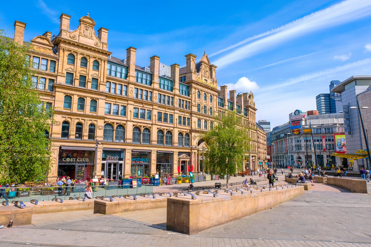 Historic buildings in vibrant city square.