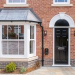 Modern brick house with stylish entrance.