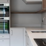 Modern kitchen with sleek appliances.