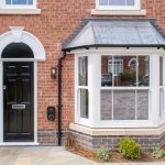 Modern brick house with bay window.