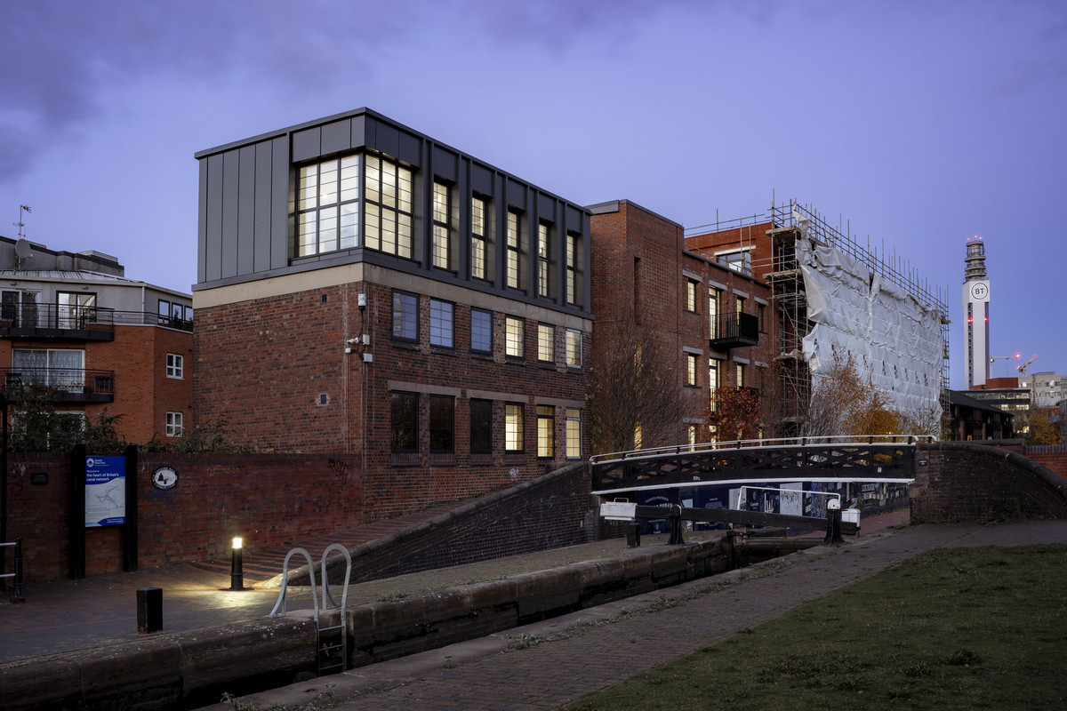 Modern building beside a canal.