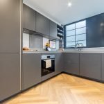 Modern kitchen with sleek cabinetry.