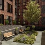 Modern courtyard with greenery and seating.