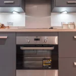 Modern kitchen with sleek appliances.