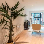 Modern living space with greenery.