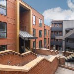 Modern buildings with brick and gold.