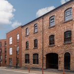 Historic brick buildings along the street.