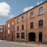 Historic brick buildings along a street.