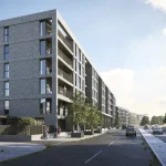 Modern residential buildings along a street.