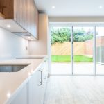 Modern kitchen with sliding glass doors