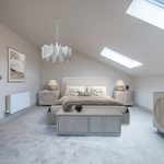 Modern, stylish bedroom with skylight.