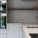 Modern kitchen with sleek appliances.