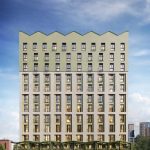 Modern building with green accents.