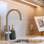 Modern kitchen with sleek sink fixtures at Avon Bard in Stratford Upon Avon.