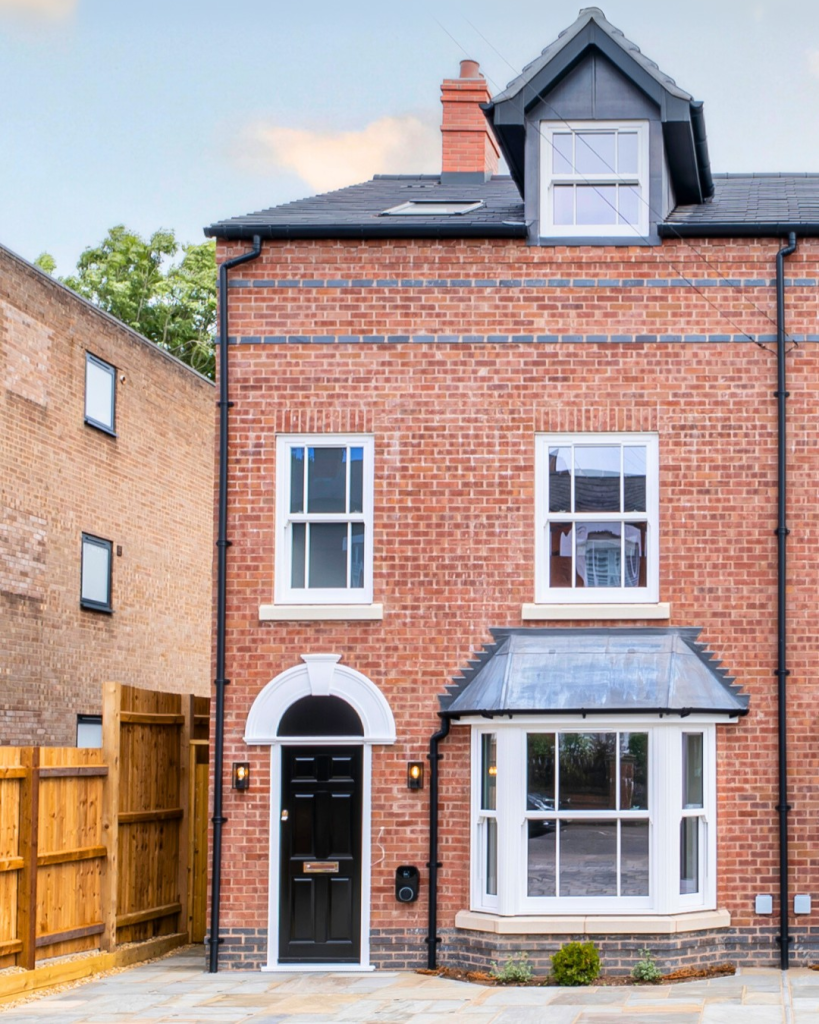 Modern semi-detached brick house with large windows in Harborne